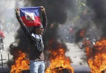 Haiti declares curfew as it tries to restore order after weekend jailbreak Haiti declares curfew as it tries to restore order after weekend jailbreak