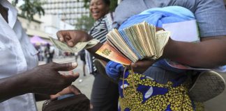 Zimbabwe unveils new currency as depreciation, inflation stoke turmoil