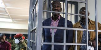 Kizza Besigye in the dock at the Makindye Court Martial in Kampala, Uganda Kizza Besigye in the dock at the Makindye Court Martial in Kampala, Uganda,