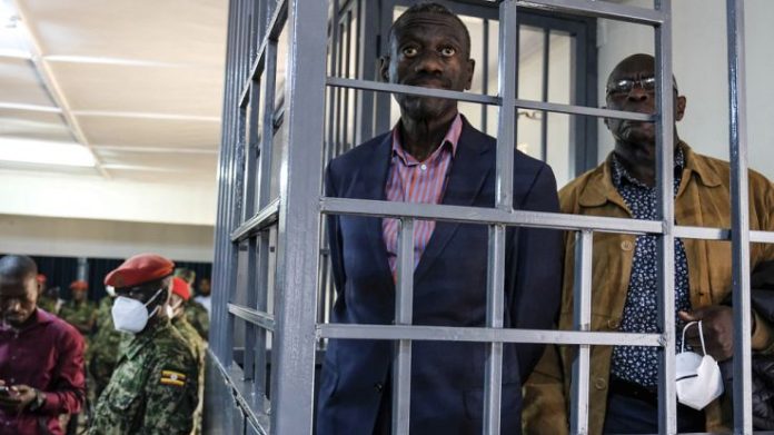 Kizza Besigye in the dock at the Makindye Court Martial in Kampala, Uganda,
